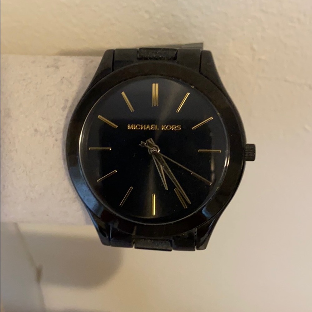Black and gold Michael Kors watch